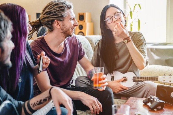 young-female-smoking-joint-with-cannabis